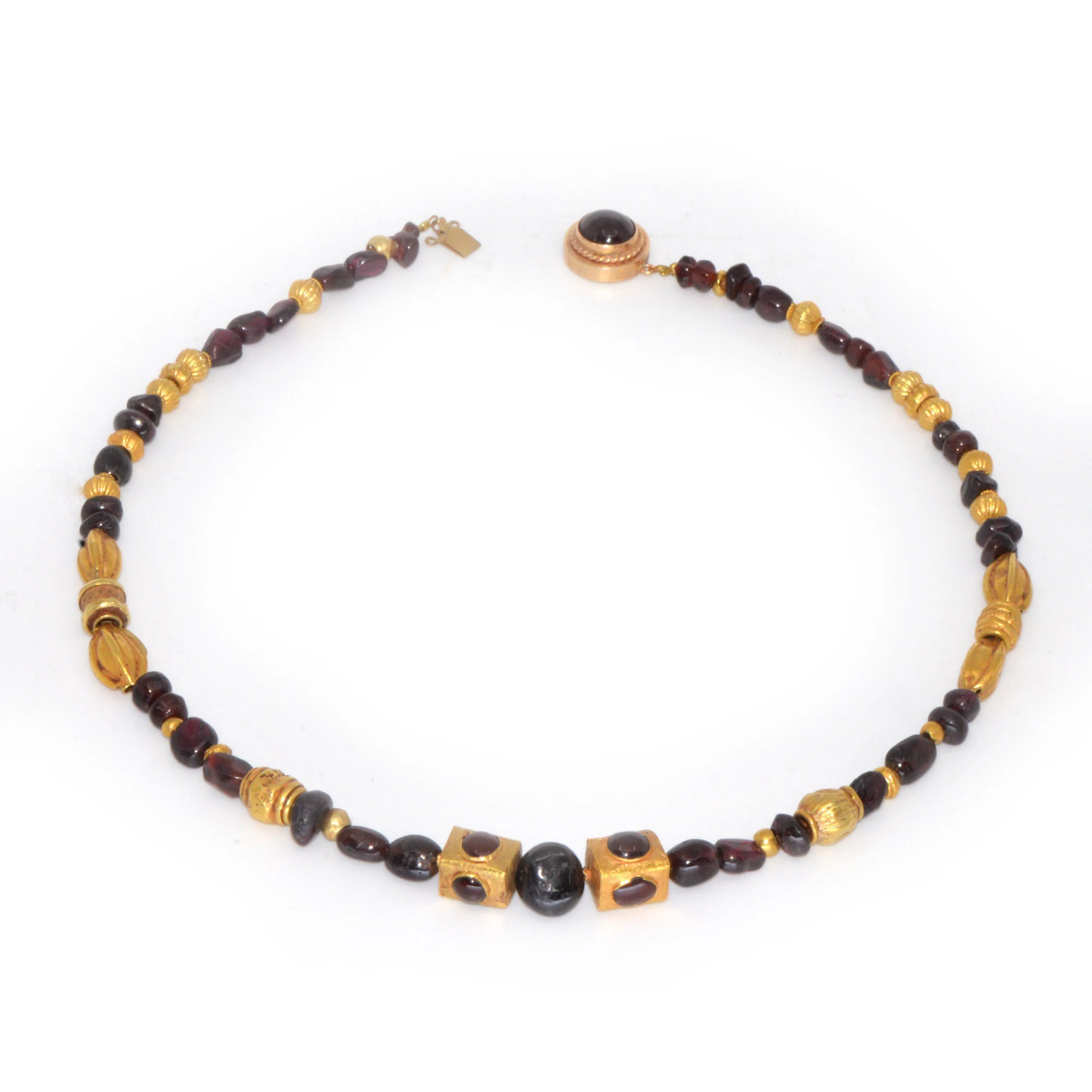 A superb Gold and Garnet Bead Necklace, Achaemenid Period, Persia, ca 550 - 300 BC