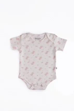 Half sleeve star pattern in soft pink bodysuit  for baby