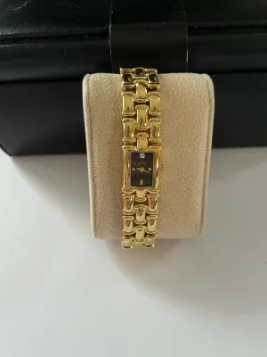 <€€ Ladies BULOVA Gold Tone Watch with Black Dial on Gold Plated Bracelete with Diamond Chip Model 97S86